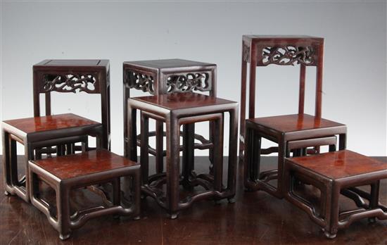 Three Chinese nests of two rosewood and burr wood stands, early 20th century,